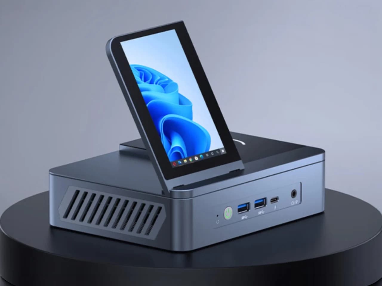 Découvrez le MiniPC Ryzen Ultime : 12 Ports, Écran de 4,5 Pouces et Chargeur Sans Fil de 15W !