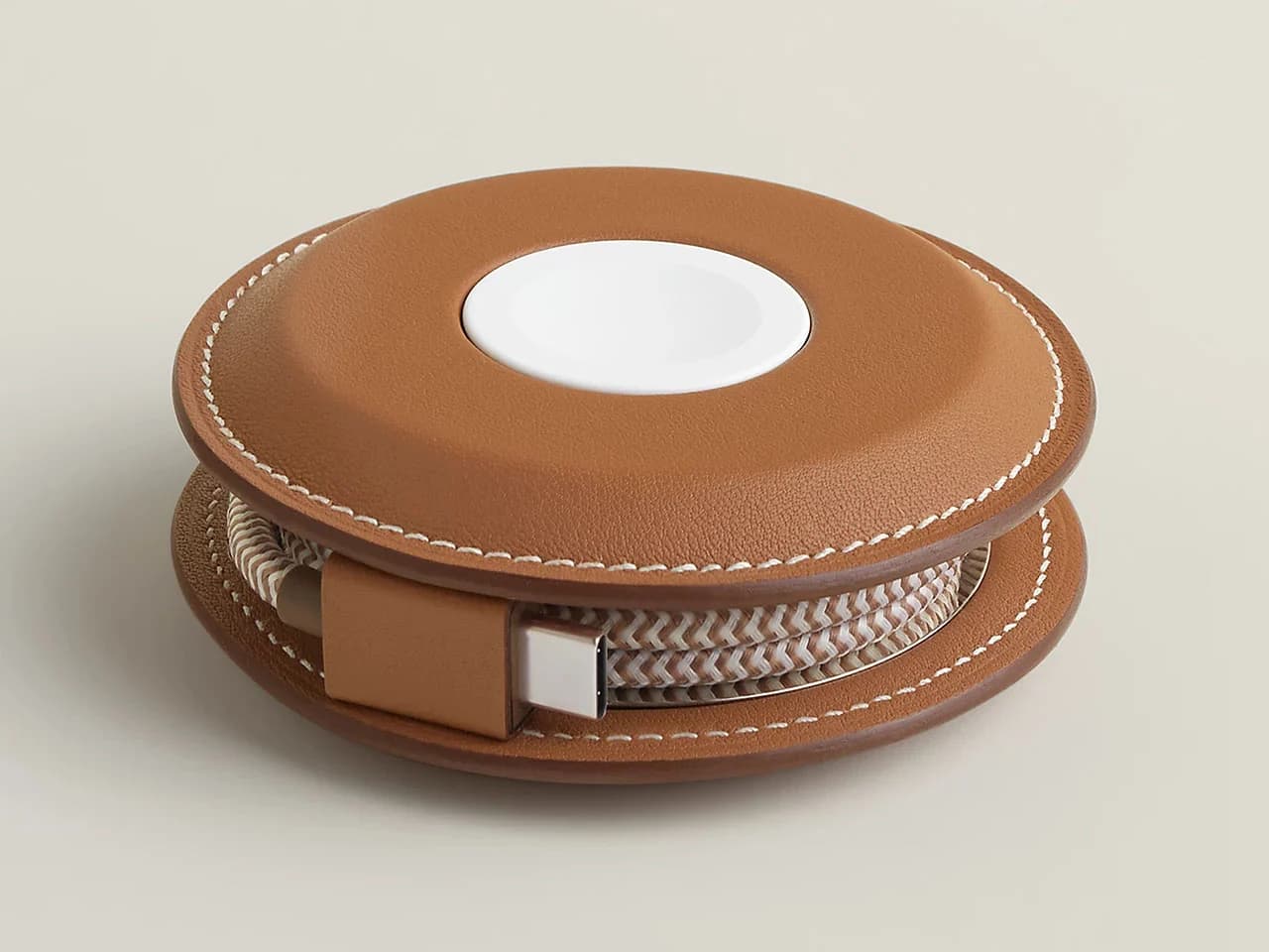 Découvrez l’Expérience de Charge Sans Fil Luxe : Hermès Paddock Yoyo Charger pour Apple!
