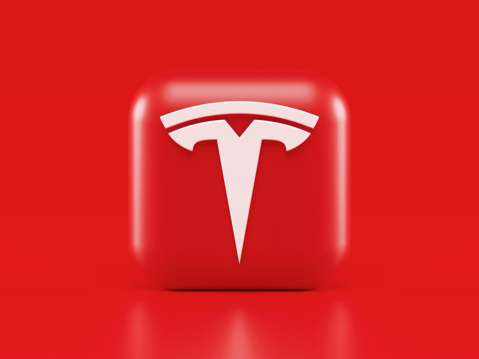 Le Tesla Cybertruck : la voiture du futur qui change le monde red and white letter m
