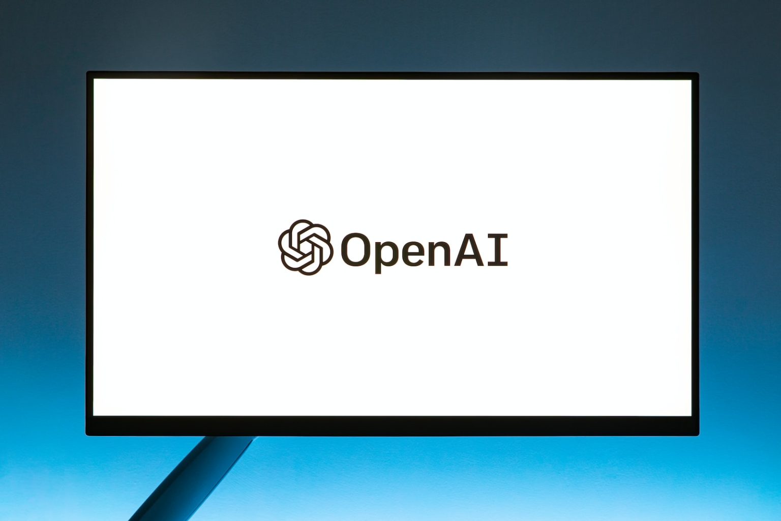 IA et SEO : Comment Optimiser votre Référencement avec l’Intelligence Artificielle a computer screen with the open ai logo on it
