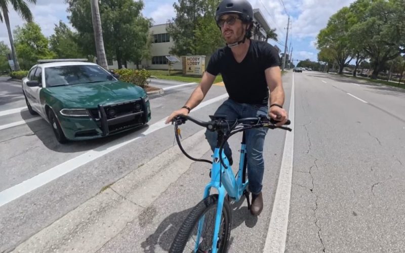 cop car cyclist header - plare.