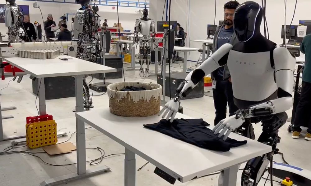 tesla optimus shirt folding laundry video - plare.