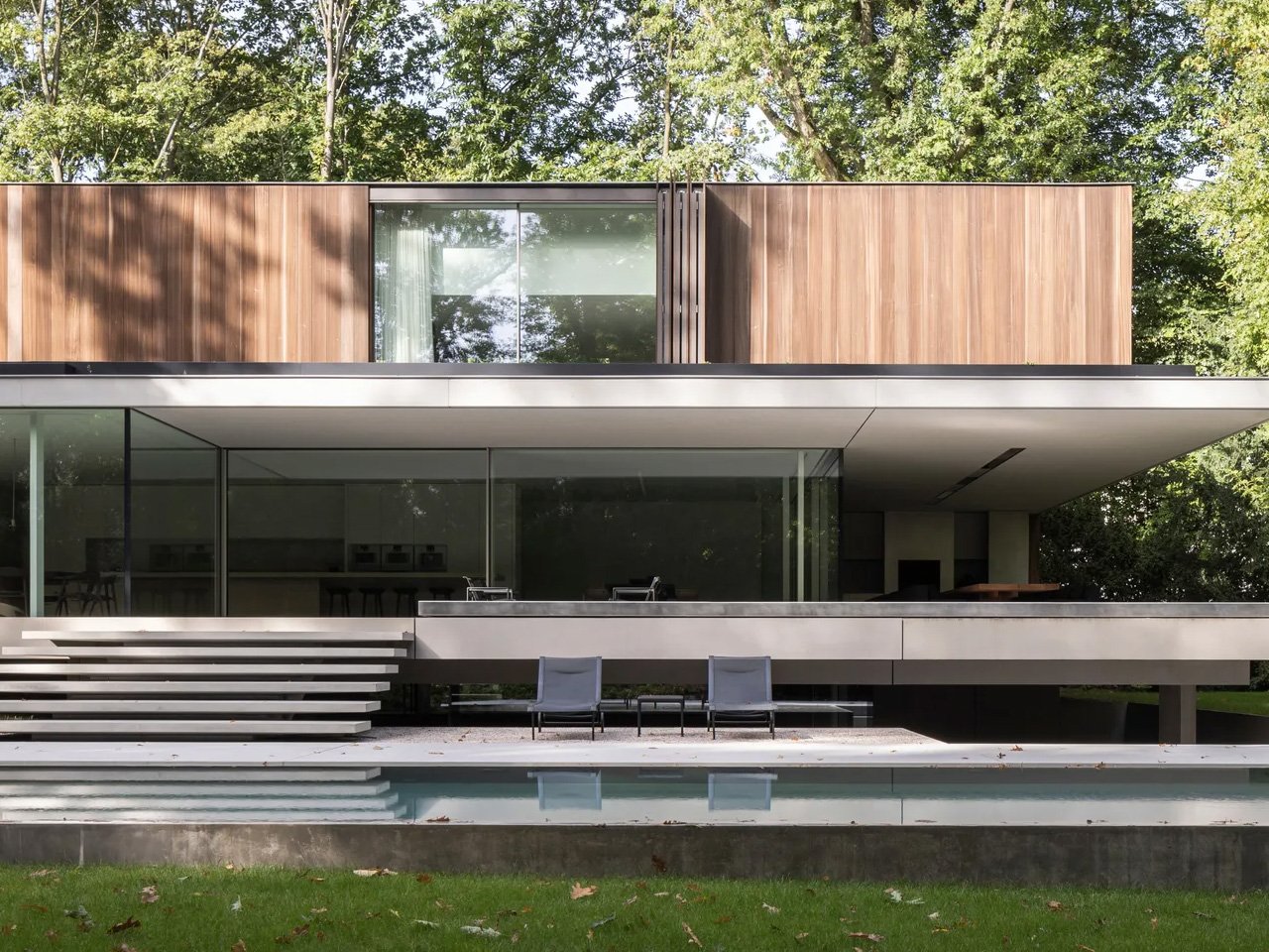 1751113177 120 Decouvrez ce Magnifique Home en Beton et Verre Votre - plare.