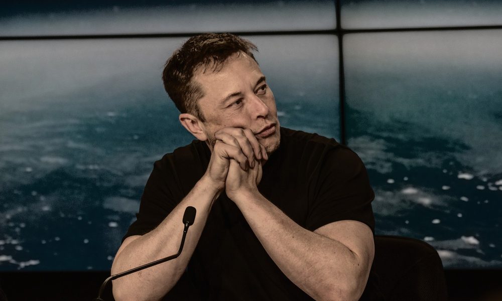 2048px Elon Musk at a Press Conference - plare.