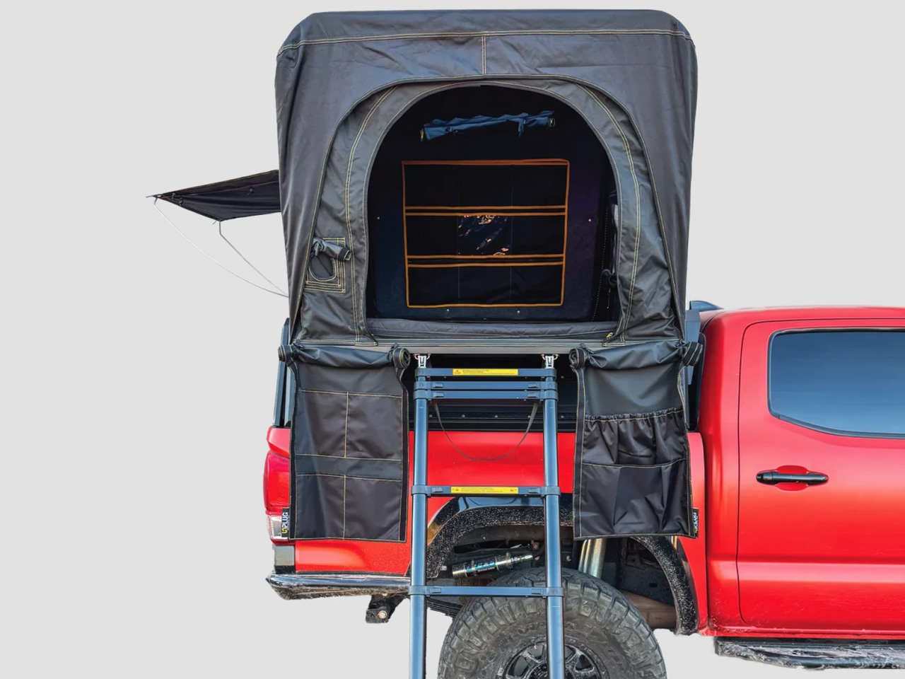 1752527821 268 Decouvrez le Pickup Topper avec Tente de Toit Integree - plare.