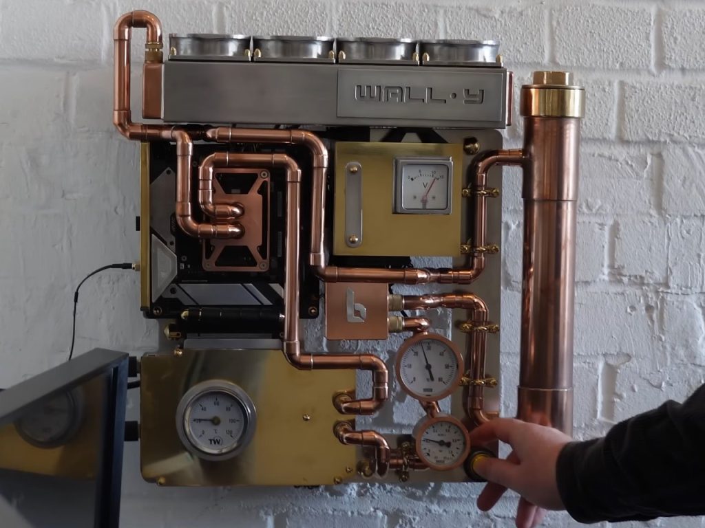 Découvrez ce boîtier PC refroidi par eau avec plomberie en laiton et cuivre : une touche Steampunk irrésistible pour votre setup !